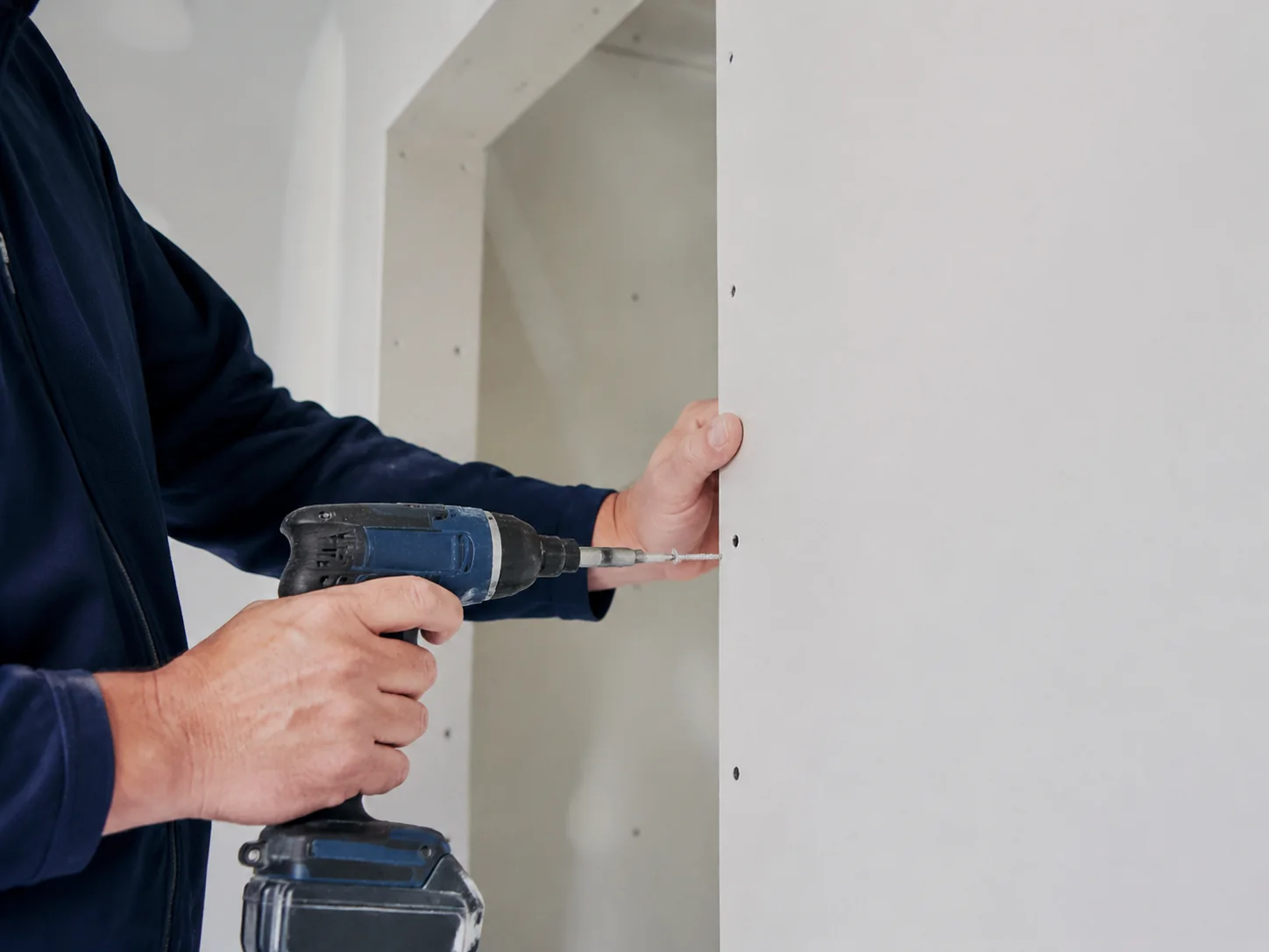 Professional drywall installation inside a home